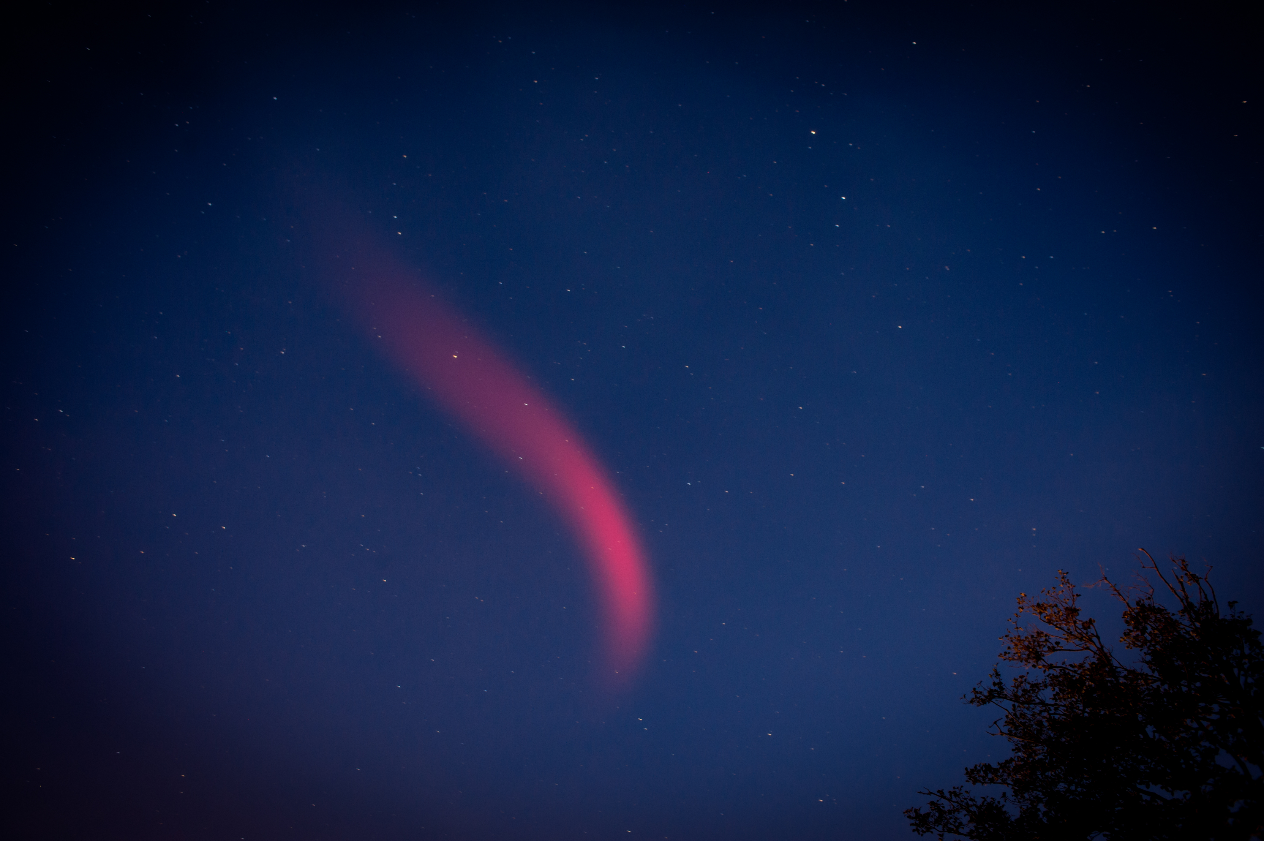 NASA's Glowing Red Clouds by Stephen Blue