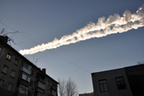 What appears to be a meteor trail over eastern Russia is seen in this image released Feb. 15, 2013, by the Russian Emergency Ministry. The meteor fall included a massive blast, according to Russian reports.