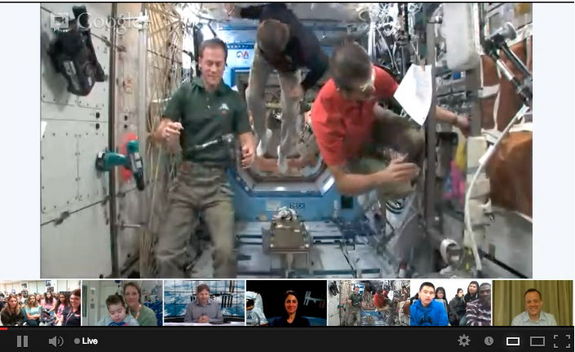Astronauts (L to R) Marshburn, Ford and Hadfield float free aboard the International Space Station at the conclusion of the Google+ Hangout on Feb. 22, 2013.