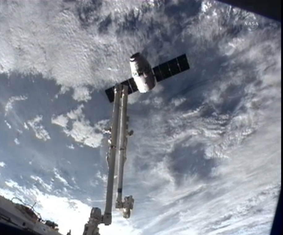 Dragon Capsule Over Earth: CRS-2