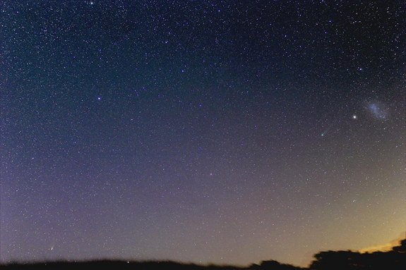 Astrophotographer Justin Tilbrook of Penwortham, South Australia, caught this photo of Comets Lemmon (bottom left) and Pan-STARRS (right near the Small Magellanic Cloud) together on Feb. 17. 2013. He writes: "This is the one I've been waiting for…. Don't mind saying it was difficult to set this up, a narrow window before sunrise, 4 degrees of hill in the way, limitations with the dome slit and having to mount the camera at the front of the scope at a very odd angle. Took about an hour."