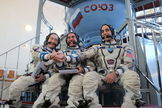 At the Gagarin Cosmonaut Training Center in Star City, Russia, Expedition 35/36 Flight Engineer Chris Cassidy (right), Soyuz Commander Pavel Vinogradov (center) and Flight Engineer Alexander Misurkin clasp hands for photographers prior to the start of qualification simulation runs in a Soyuz spacecraft mock-up on March 5, 2013. The three crew members are training for launch March 29, Kazakh time, to the International Space Station in their Soyuz TMA-08M spacecraft from the Baikonur Cosmodrome in Kazakhstan.