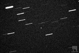 The 460-foot (140-meter) asteroid 2013 ET is seen through a Slooh Space Camera telescope in the Canary Islands on March 9, 2013, during its close approach to Earth. The asteroid was just within 600,000 miles of Earth, about 2.5 times the Earth-moon distance.