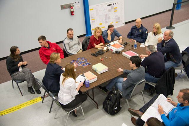 Expedition 36 Crew Members Sit Together