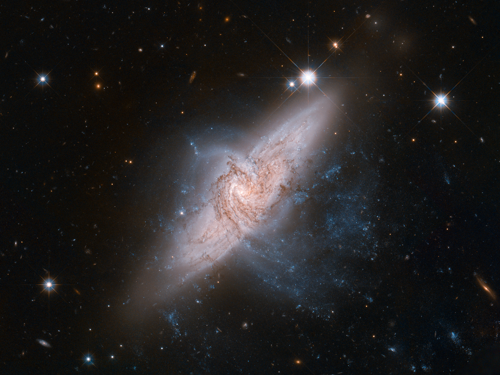 Hubble view of NGC 3314 space wallpaper