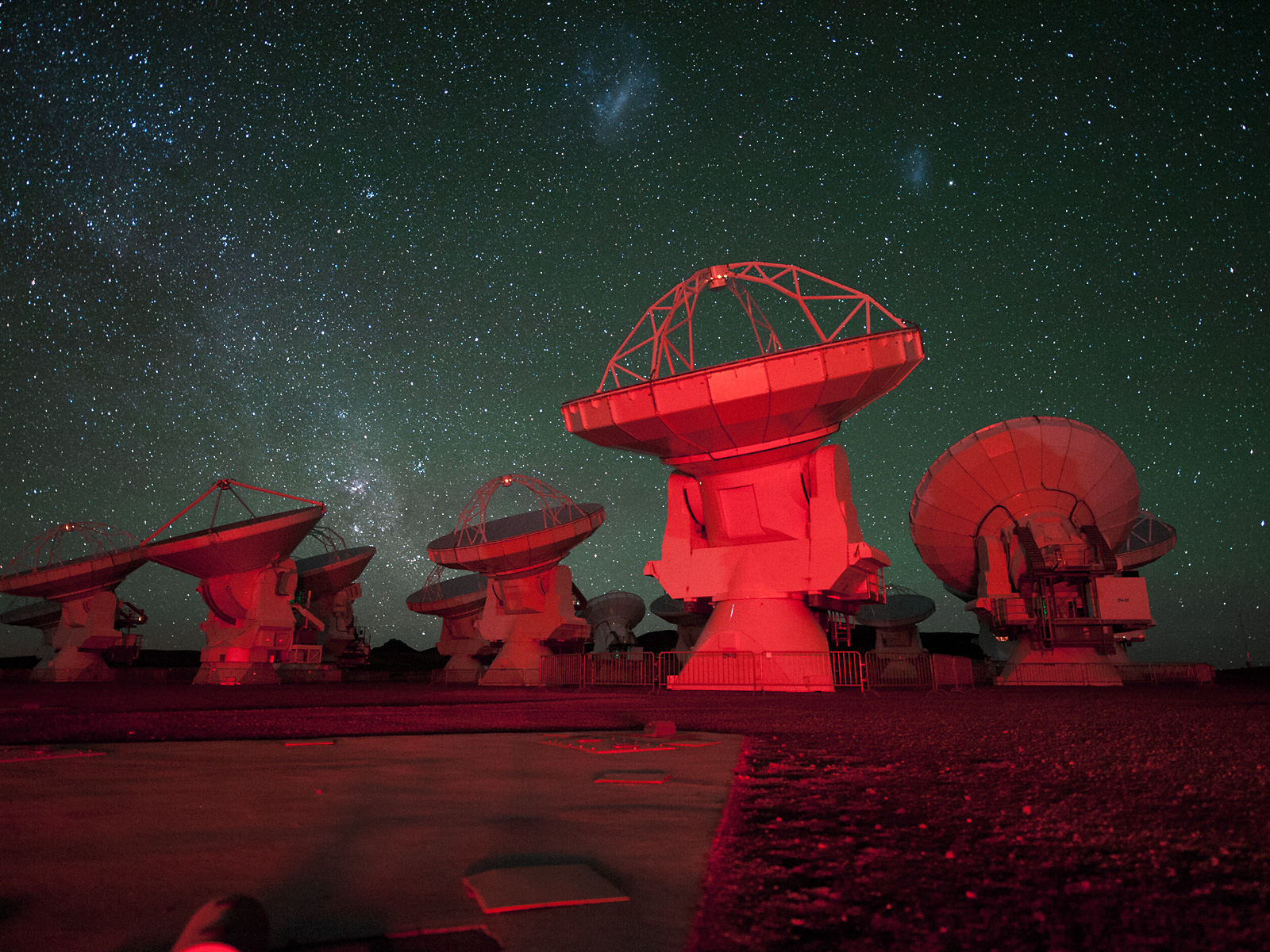 ALMA Antennae Bathed in Red Light Space Wallpaper