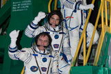 Expedition 35 Russian Flight Engineer Alexander Misurkin, top, NASA Flight Engineer Chris Cassidy, and Soyuz Commander Pavel Vinogradov, bottom, wave farewell from the base of the Soyuz rocket at the Baikonur Cosmodrome in Baikonur, Kazakhstan, Friday, March 29, 2013. Their Soyuz TMA-08M rocket launched at 2:43 a.m. local time.