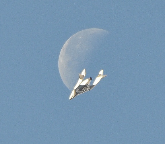 SpaceShipTwo shoots the moon during April 3 test flight at Mojave Air and Space Port.