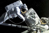 Astronauts return samples from an asteroid into their Orion spacecraft while orbiting high above the moon in this still image from a video NASA's Asteroid Retrieval and Utilization mission.