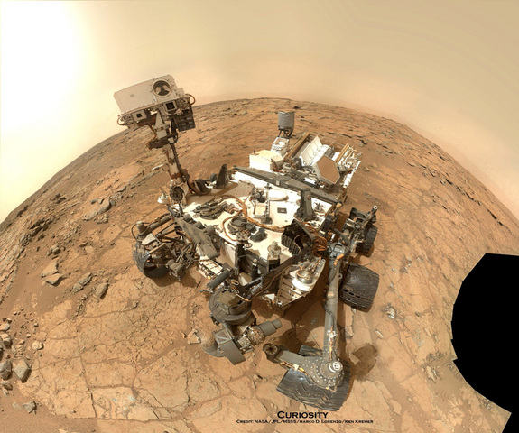 NASA's Mars rover Curiosity took this self-portrait, composed of more than 50 images using its robotic arm-mounted MAHLI camera, on Feb. 3, 2013. The image shows Curiosity at the John Klein drill site. A drill hole is visible at bottom left.