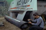Spock (Leonard Nimoy) surveys damage from Galileo’s crash landing on planet Taurus II (episode “The Galileo Seven”)