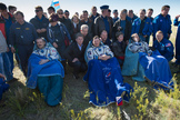 Expedition 35 Commander Chris Hadfield of the Canadian Space Agency (CSA), left, Russian Flight Engineer Roman Romanenko of the Russian Federal Space Agency (Roscosmos), center, and NASA Flight Engineer Tom Marshburn sit in chairs outside the Soyuz Capsule just minutes after they landed in a remote area outside the town of Dzhezkazgan, Kazakhstan, on Tuesday, May 14, 2013.