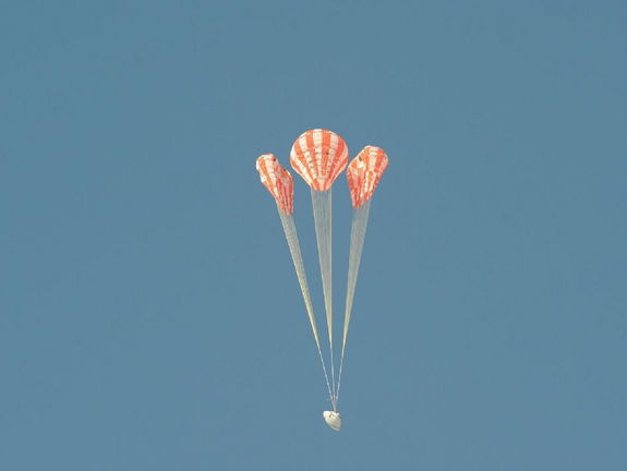 To test the Orion parachute system on May 1, 2013, engineers rigged one of the test capsule’s three main parachutes – the middle parachute in this view – to skip one stage of its inflation, putting additional stress on the vehicle as it opened. Testing irregularities allows engineers to verify the parachutes are reliable even when something goes wrong.