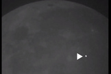 This photo shows the bright flash of the light that resulted from a huge boulder slamming into the moon's surface March 17, 2013.