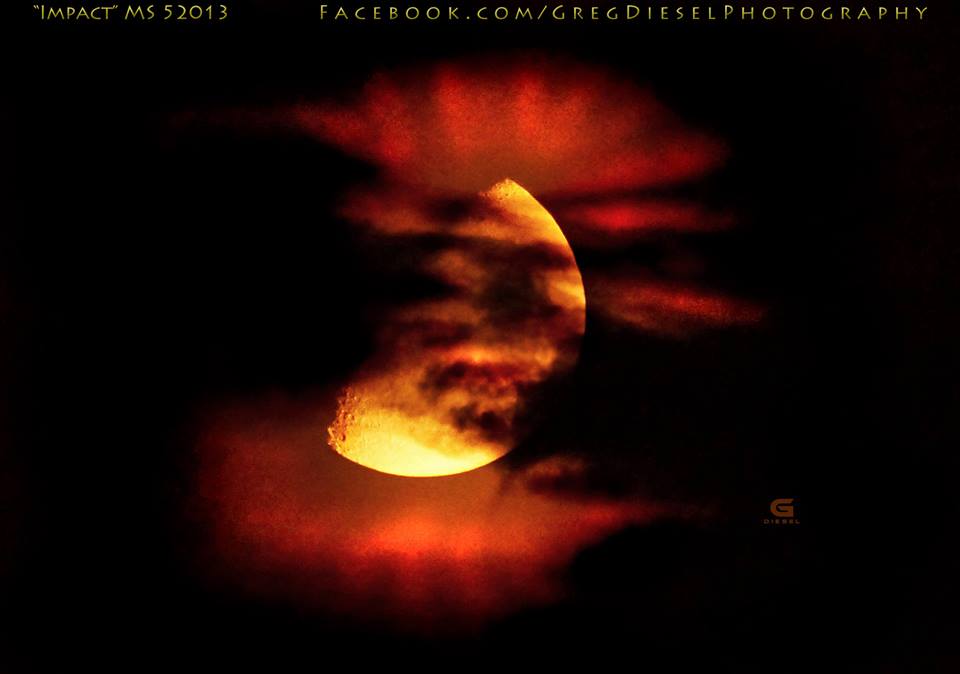 Moonset through clouds