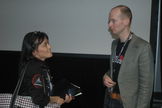 Mars One founder Bas Lansdorp discusses pressure suit technology with an MIT professor attending his talk at the Space Technology Expo.