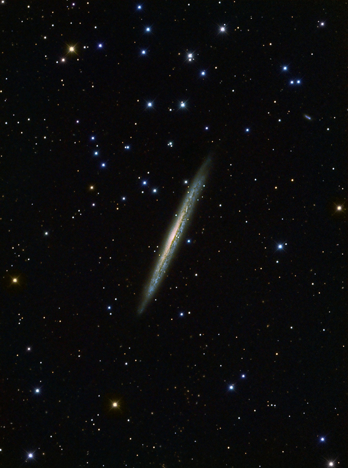 Ouch! Galaxy Cuts Like a Knife in Stunning Image