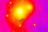 An alternate-color version of a photo of the dwarf galaxy IC3418, which appears to be in the process of dying.