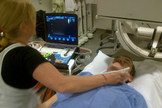 A technician performs an ultrasound of astronaut Chris Hadfield's spine, focusing on the vertebrae of his head and neck, a few days after Hadfield returned to Earth May 13, 2013.
