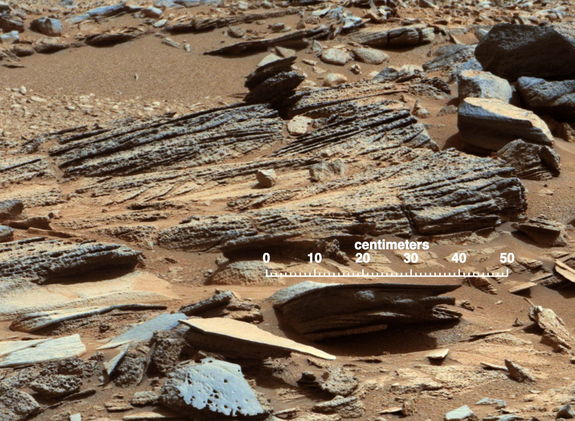 This image from the Mast Camera (Mastcam) on NASA's Mars rover Curiosity shows inclined layering known as cross-bedding in an outcrop called "Shaler" on a scale of a few tenths of meters, or decimeters (1 decimeter is nearly 4 inches). Image released January 15, 2013.
