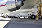 This image shows technicians and engineers at Vandenberg Air Force Base in California connecting the Pegasus XL rocket with the Interface Region Imaging Spectrograph, or IRIS, solar observatory to the Orbital Sciences L-1011 carrier aircraft. This image was released June 19, 2013.