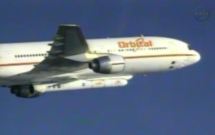 IRIS Spacecraft Rises into Sky Aboard Carrier Plane