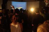 Members of the public at NASA's Ames Research Center in Moffett Field, Calif., watch a live video feed of the agency's IRIS solar telescope as it soars toward space from a drop point over the Pacific Ocean on June 27, 2013.