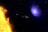 This illustration shows a "hot Jupiter" planet known as HD 189733b orbiting its star, HD 189733. The NASA/ESA Hubble Space Telescope measured the actual visible light color of the planet, which is deep blue. Image released July 11, 2013.