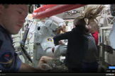 Astronaut Luca Parmitano re-enters the International Station following the cancellation of a spacewalk on July 16, 2013.