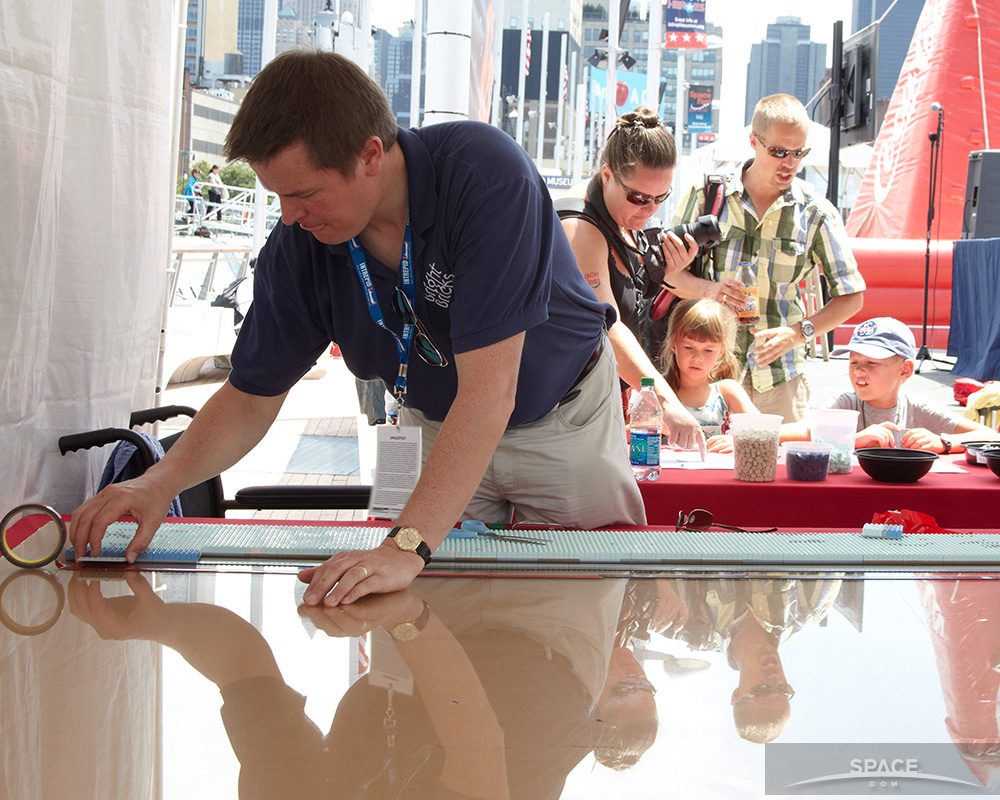 LEGO ‘Master Builder’ Works on Mosaic Project at SpaceFest