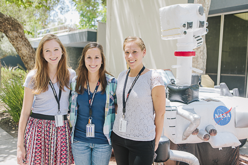Celebrators Pose in Front of Inflatable Curiosity