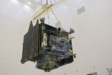A crane lifts NASA's Mars Atmosphere and Volatile Evolution (MAVEN) spacecraft inside the Payload Hazardous Servicing Facility on Aug. 3, 2013, at the agency’s Kennedy Space Center in Florida.
