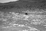 This view from NASA's Opportunity Mars rover, taken on Aug. 3, 2013, shows an area where two geological units abut. The darker unit in the background, believed to be older, marks the edge of "Solander Point," a raised segment of the western rim of Endeavour Crater.