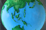 The continents and oceans of the cake are made out of fondant and edible paint. Image uploaded on Aug. 27, 2013.