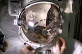 Water fills the empty spacesuit helmet of Italian astronaut Luca Parmitano in an Aug. 27, 2013 test of the faulty spacewalking gear, which forced NASA to abort a July 16 spacewalk for safety reasons. The water leak confirmation will help NASA engineers devise repair methods for the spacesuit.