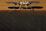 This artist's concept depicts the stationary NASA Mars lander known by the acronym InSight at work studying the interior of Mars. The InSight mission (for Interior Exploration using Seismic Investigations, Geodesy and Heat Transport) is scheduled to launch in March 2016 and land on Mars six months later. Image released Sept. 4, 2013.