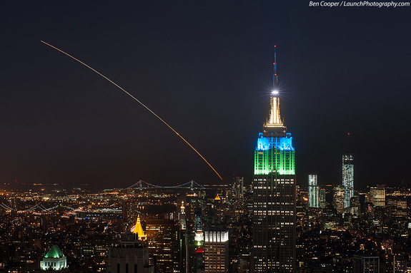 Veteran launch photographer Ben Cooper captured this spectacular photo of NASA's LADEE moon probe soaring across the night sky from Top of the Rock, Rockefeller Center, in New York City, about 200 miles north of the launch pad at NASA's Wallops Flight Facility on Wallops Island, Va., on Sept. 6, 2013. A Minotaur V rocket launched the LADEE probe at 11:27 p.m. EDT.