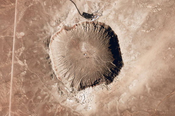 Meteor Crater is one of the youngest and best-preserved impact craters on Earth. The crater formed roughly 50,000 years ago when a 30-meter-wide, iron-rich meteor weighing 100,000 tons struck the Arizona desert at an estimated 20 kilometers per second. The resulting explosion exceeded the combined force of today's nuclear arsenals and created a 1.1-kilometer-wide, 200-meter-deep crater.