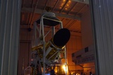 This photo shows the Comet ISON-hunting BRRISON balloon gondola pointing out the door of the hangar for a night time pointing test, to acquire images of stars and planets with both instruments. The instrument will ride a giant NASA balloon to track Comet ISON, the potential "comet of the century."