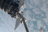 This close-up shows the first Cygnus commercial cargo spacecraft built by Orbital Sciences Corp. attached to the end of the robotic arm on the International Space Station after the two spacecraft met at 7 a.m. ET on Sept. 29, 2013.