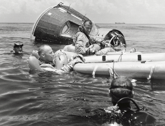 The Prime crew for the Gemini 5 space flight complete practice survival training on July 21, 1965.