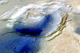 This image shows a 3-dimensional view of Eden Patera looking toward the east. Color image data from the High Resolution Stereo Camera (HRSC) were draped over digital topographic data from the same instrument.