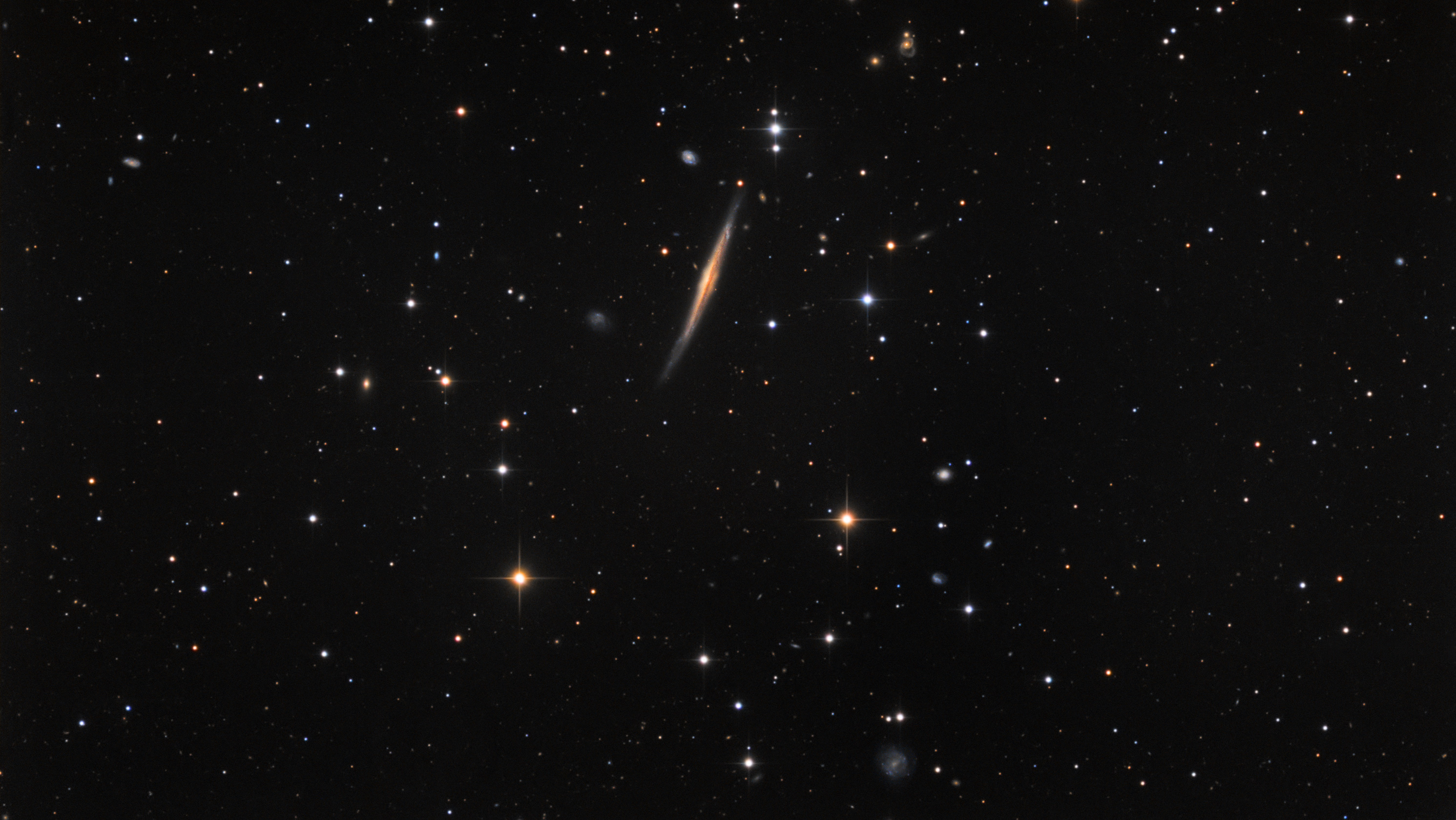 Knife-Edge Galaxy Appears to Slice Through Space in Amateur Astronomer's Photo