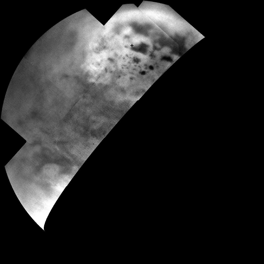 Dark Lakes on Bright Titan Landscape