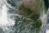 NASA's Aqua satellite captured this image, in which fires in the Chinese countryside appear as red dots, on Oct. 3, 2013.