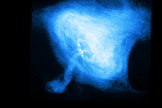 In the Crab Nebula, a rapidly rotating neutron star, or pulsar (white dot near the center), powers the dramatic activity seen by the Chandra X-ray Observatory. The inner X-ray ring is thought to be a shock wave that marks the boundary between the surrounding nebula and the flow of matter and antimatter particles from the pulsar.