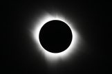 Eclipse chasers positioned along the narrow track of the November 3rd hydrid eclipse from Gabon to Kenya in Africa will get to see a total solar eclipse lasting up to a minute, weather permitting. During totality, the sun’s outer atmosphere, called the corona, blazes forth in all its glory. This view of the corona on July 11, 2010, was captured by Imelda Joson and Edwin Aguirre from the Tatakoto Atoll in French Polynesia’s Tuamotu Archipelago using a Takahashi FC-60 apochromatic refractor and Canon EOS 7D DSLR camera.