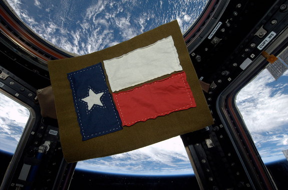 ISS Expedition 37 flight engineer Karen Nyberg sewed this Texas flag from fabric she cut from t-shirts she wore in space.