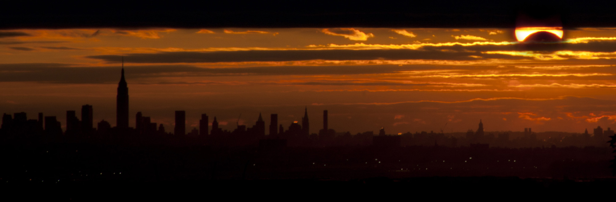 Nov. 3, 2013 Solar Eclipse Over NYC: Nick Sperling