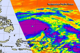 Infrared data from the AIRS instrument aboard NASA's Aqua satellite show cloud top temperatures as cold as 210 degrees kelvin/-81.67F/-63.15C/ in the thick band of thunderstorms around the center of Super Typhoon Haiyan on Nov. 7, 2013. Those cold temperatures indicate very high, powerful thunderstorms with very heavy rain potential.